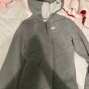 Grey Nike zip up hoodie. Children’s (one flaw)